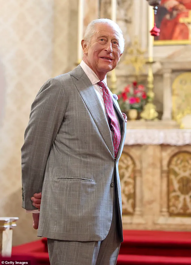Queen Camilla Braves the Rain in Elegantly Monochrome Ensemble as Royal Colonel at New Normandy Barracks