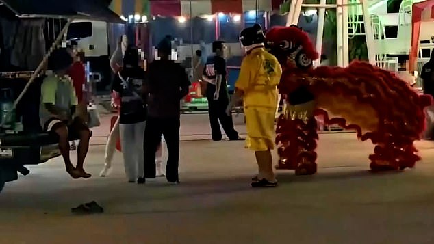 Thai Police in Red Dragon Costume Apprehend Art Theif in Unprecedented Lunar New Year Operation