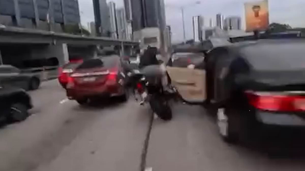 Toddler's Sudden Action Triggers Chain Reaction Crash on Kuala Lumpur Motorway, Leaving Motorcyclists Injured