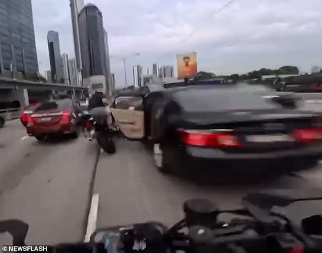 Toddler's Sudden Action Triggers Chain Reaction Crash on Kuala Lumpur Motorway, Leaving Motorcyclists Injured