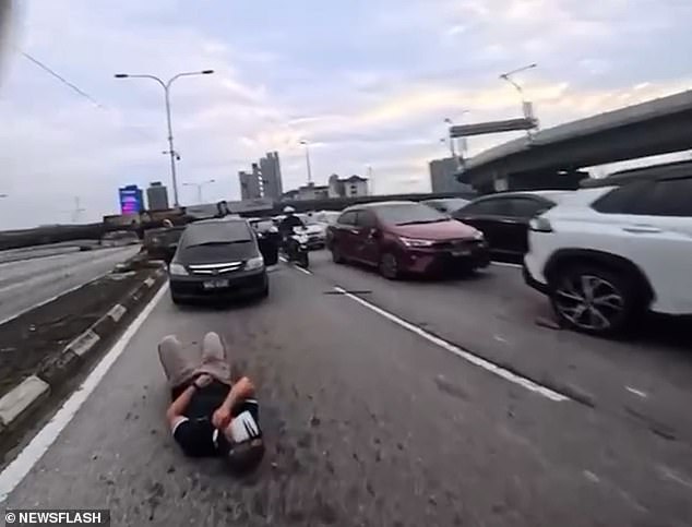 Toddler's Sudden Action Triggers Chain Reaction Crash on Kuala Lumpur Motorway, Leaving Motorcyclists Injured
