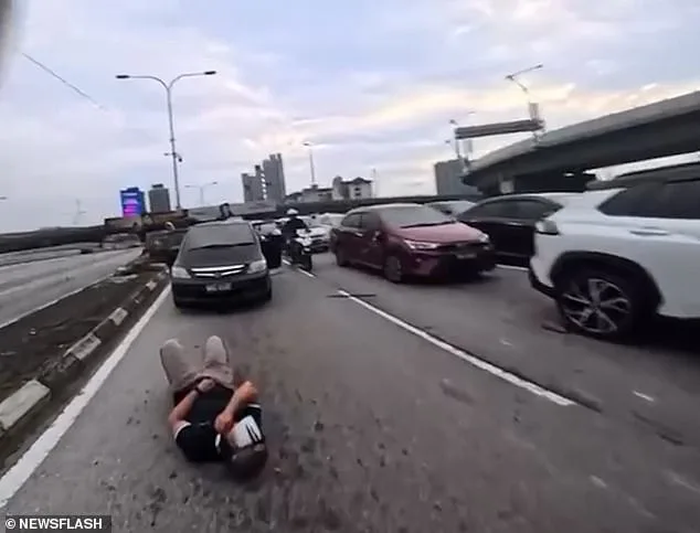 Toddler's Sudden Action Triggers Chain Reaction Crash on Kuala Lumpur Motorway, Leaving Motorcyclists Injured