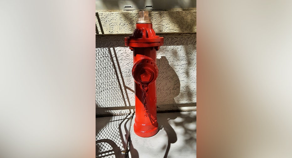 Veteran Fire Inspector Challenges HOA Over Vintage Iraq Hydrant Display