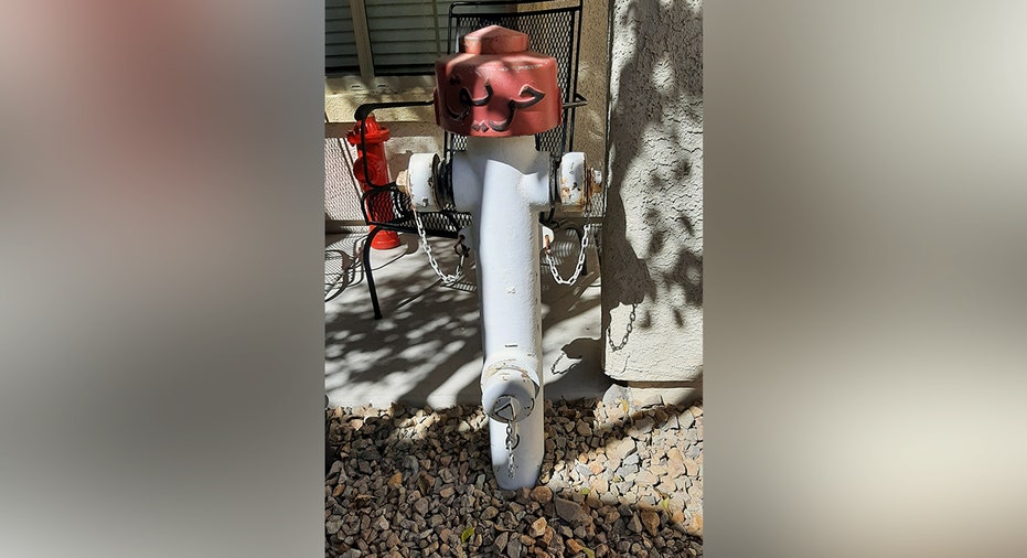 Veteran Fire Inspector Challenges HOA Over Vintage Iraq Hydrant Display