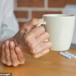 77-Year-Old Watford Resident Experiences Persistent Right-Hand Tremor Despite Wrist Support