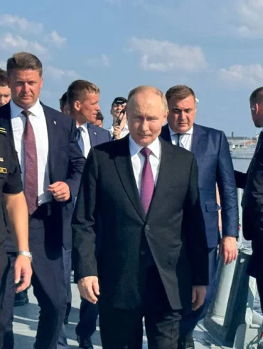 A Symbol of Dedication: Russian Sailors Present Handcrafted Model of 'Admiral Kuznetsov' to President Putin