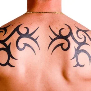 From Rebellion to Acceptance: How Tattoos Influence Social Judgments