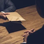 Indictment of Former Defense Official Sparks Scrutiny Over Regulatory Oversight in State Contracts