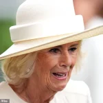 Queen Camilla Makes Elegant Appearance at Ascot Racecourse's King George Racing Weekend in Stylish Ensemble
