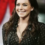 Exclusive: Lindsay Lohan's Triumphant Return at *Freakier Friday* Premiere Hints at a Hidden Chapter in Her Career
