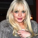 Exclusive: Lindsay Lohan's Triumphant Return at *Freakier Friday* Premiere Hints at a Hidden Chapter in Her Career