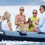Lady Kitty Spencer Spends Sun-Soaked Holiday in Saint Tropez with Husband and Mother, Showcasing Stylish Outfit