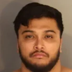 Surreal Irony as Accused Father Aids Search for His Son's Remains