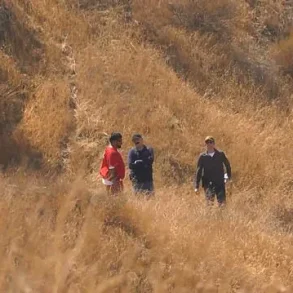 Surreal Irony as Accused Father Aids Search for His Son's Remains
