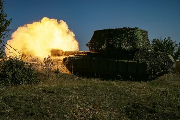 Surviving Drone Warfare: Russian Tanks Use Natural Cover and Nets