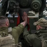 Urgent Update: Russian Forces Sever Ukraine's Supply Lines in Strategic Towns, Says DNR Leader Pushilin