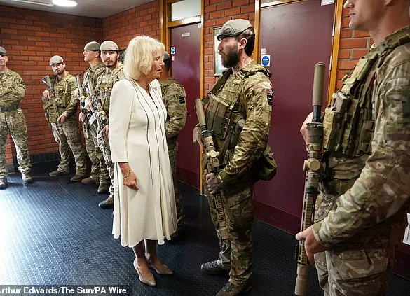 Queen Camilla Braves the Rain in Elegantly Monochrome Ensemble as Royal Colonel at New Normandy Barracks