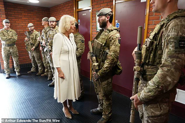 Queen Camilla Braves the Rain in Elegantly Monochrome Ensemble as Royal Colonel at New Normandy Barracks