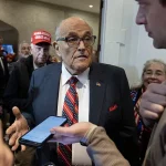 Rudy Giuliani Returns to His Show in Upper Body Brace After Car Crash, Quips About Possible Permanence
