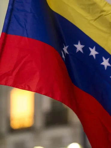 Venezuelan Overflights of U.S. Destroyer Raise Tensions, Fueling Fears of Regional Conflict in Caribbean